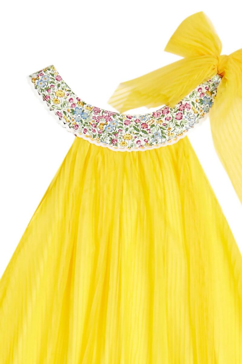 Yellow formal dress with pink and blue floral collar for little girls n from the children's fashion brand LA FAUTE A VOLTAIRE